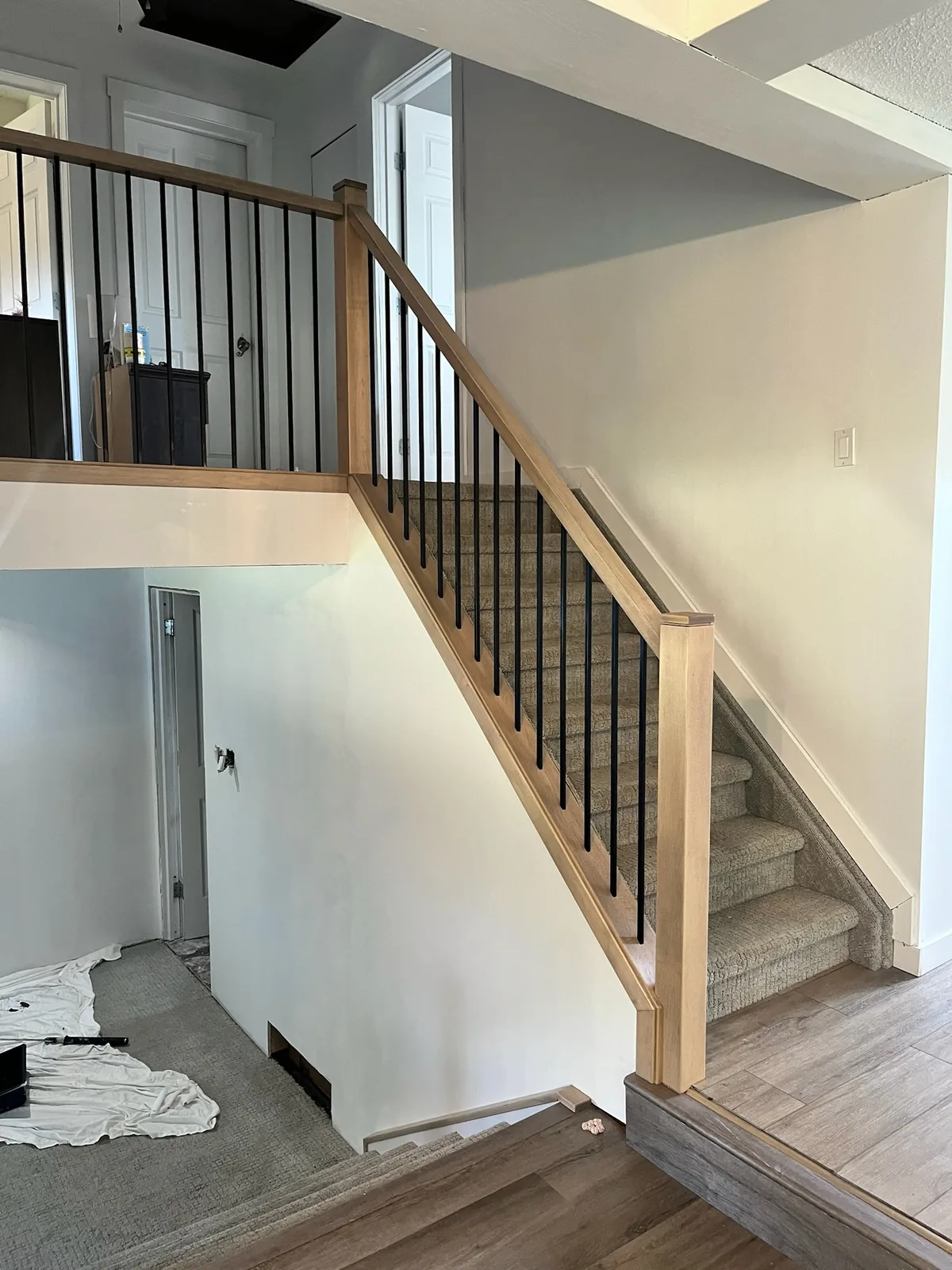 Custom staircase and railing built by Ben's Carpentry in the Edmonton area