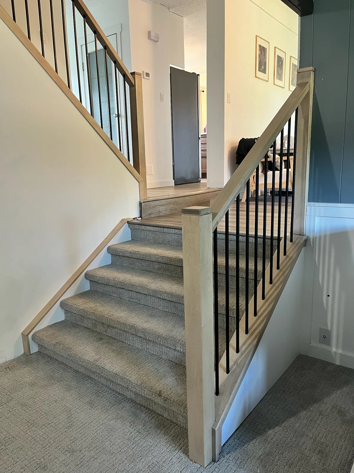 Custom staircase and railing built by Ben's Carpentry in the Edmonton area