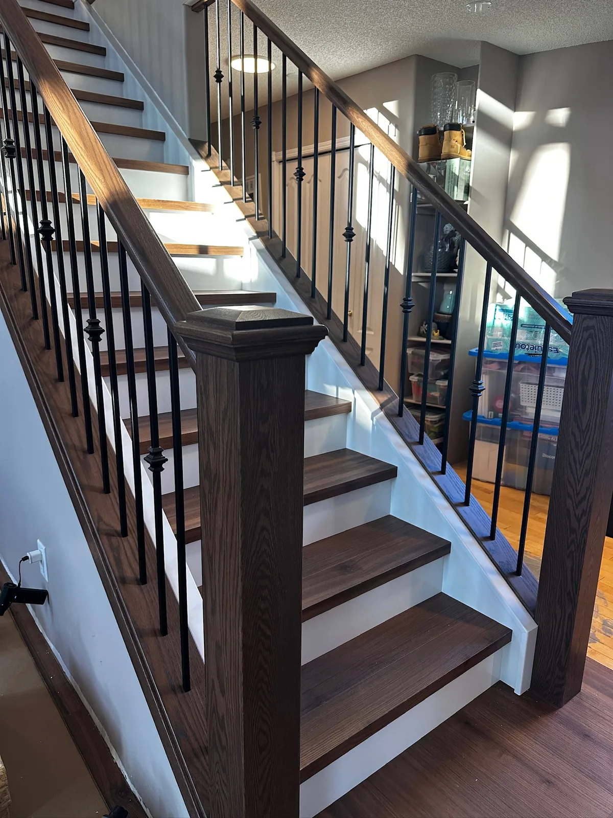 Custom staircase and railing built by Ben's Carpentry in the Edmonton area