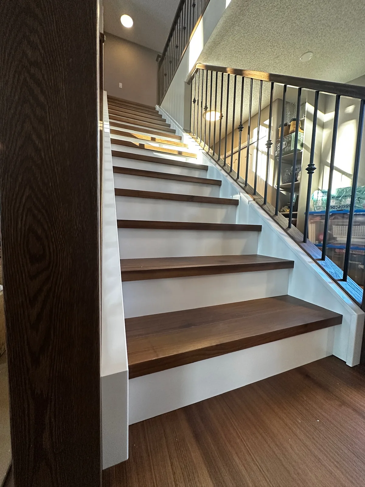 Custom staircase and railing built by Ben's Carpentry in the Edmonton area