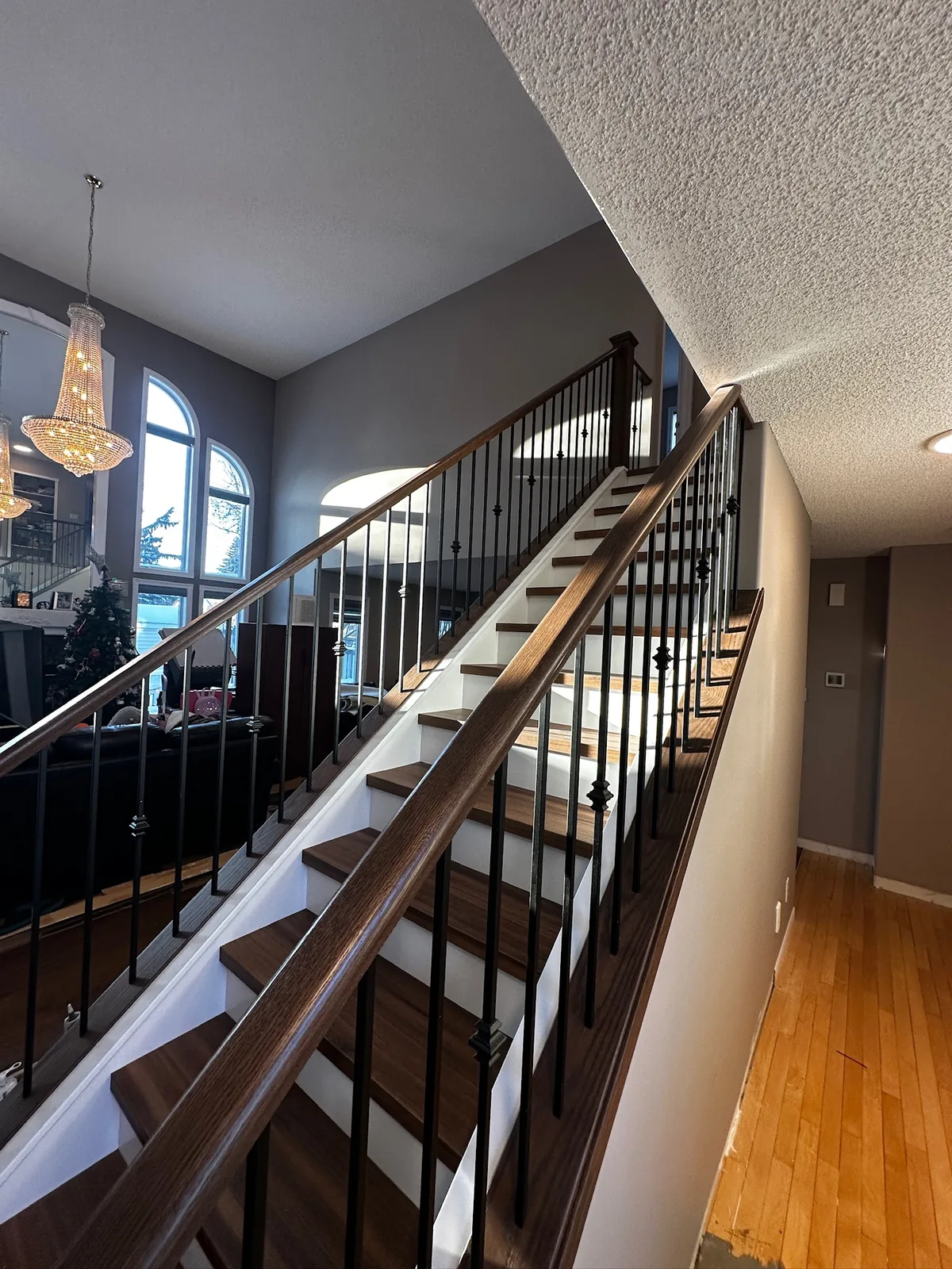 Custom staircase and railing built by Ben's Carpentry in the Edmonton area