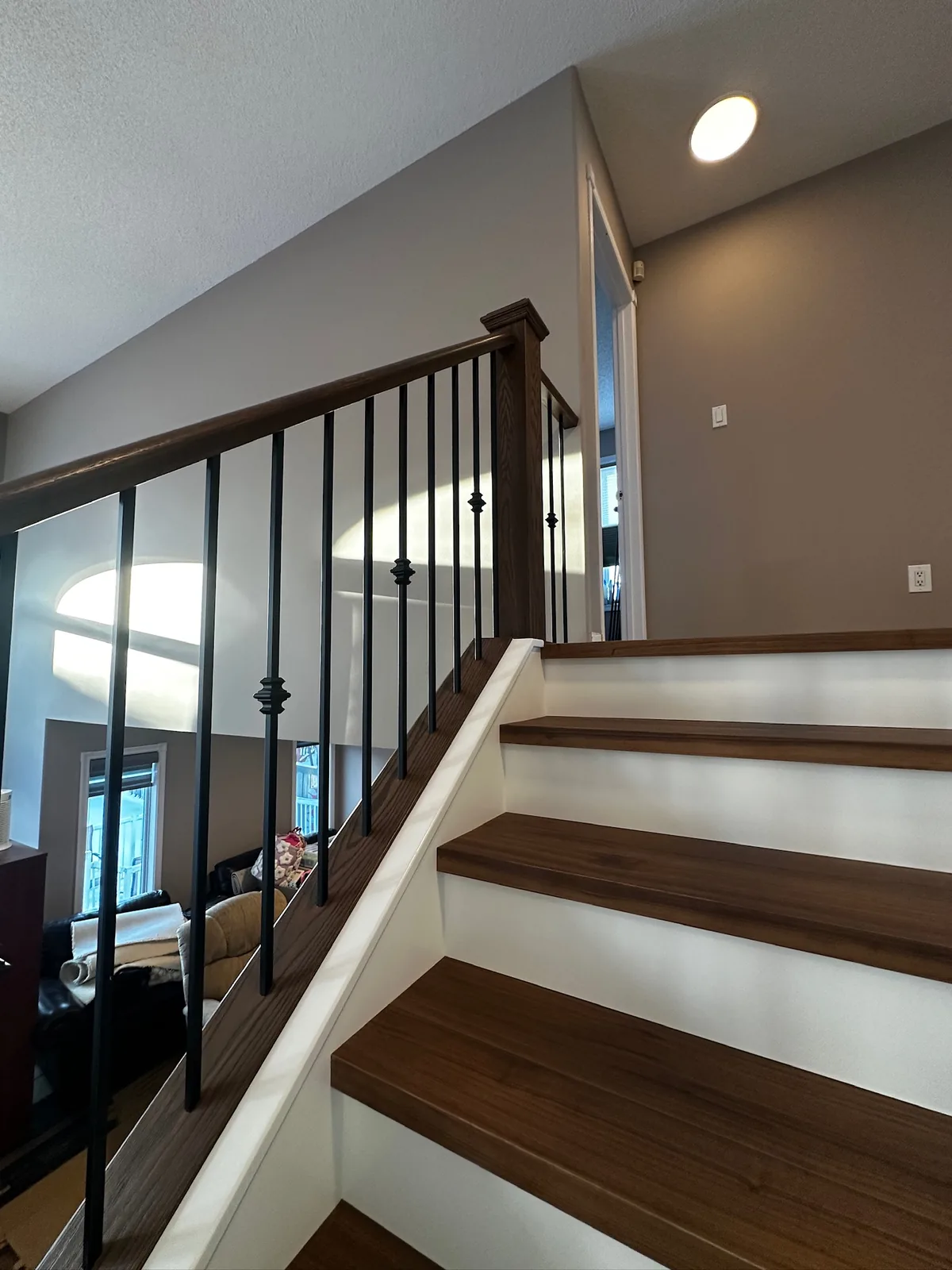 Custom staircase and railing built by Ben's Carpentry in the Edmonton area