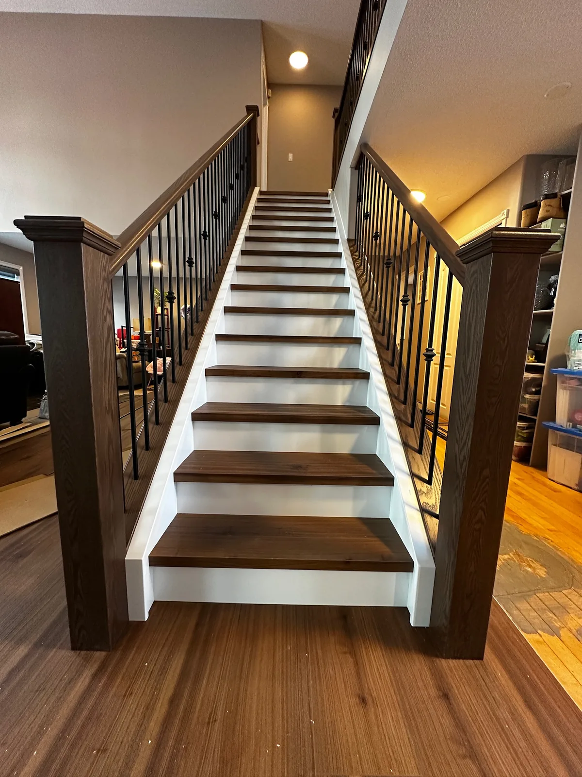 Custom hardwood staircase with walnut treads built in an Edmonton home
