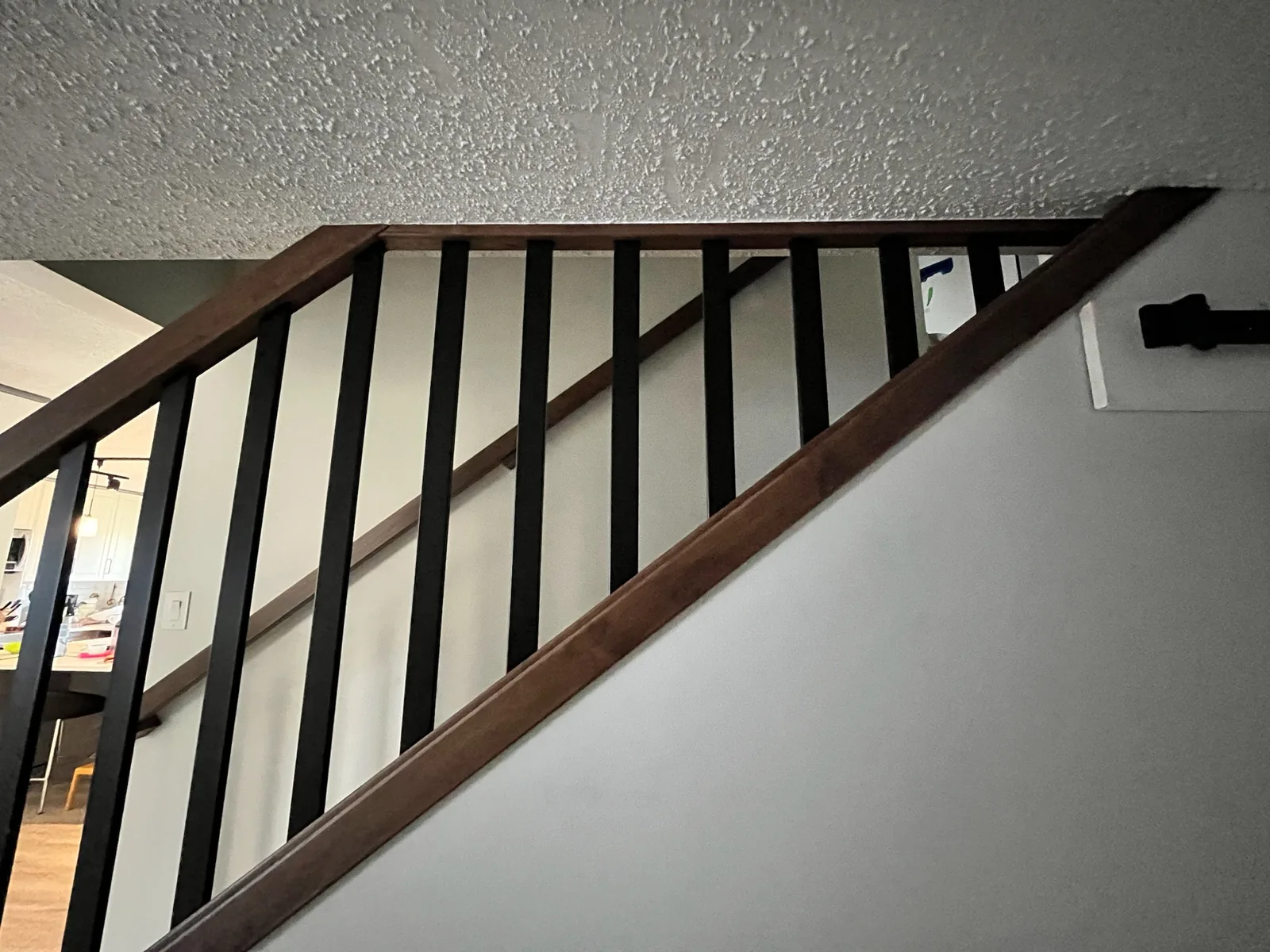 Custom staircase and railing built by Ben's Carpentry in the Edmonton area