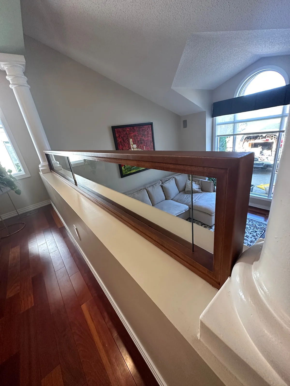 Custom staircase and railing built by Ben's Carpentry in the Edmonton area