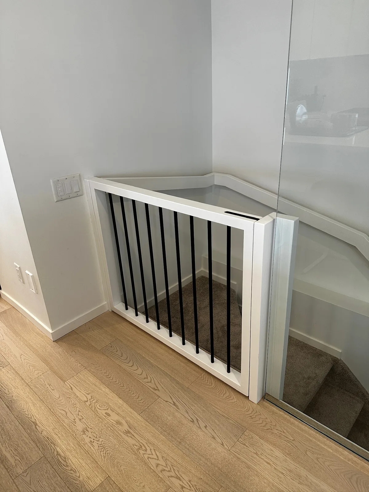 Custom staircase and railing built by Ben's Carpentry in the Edmonton area