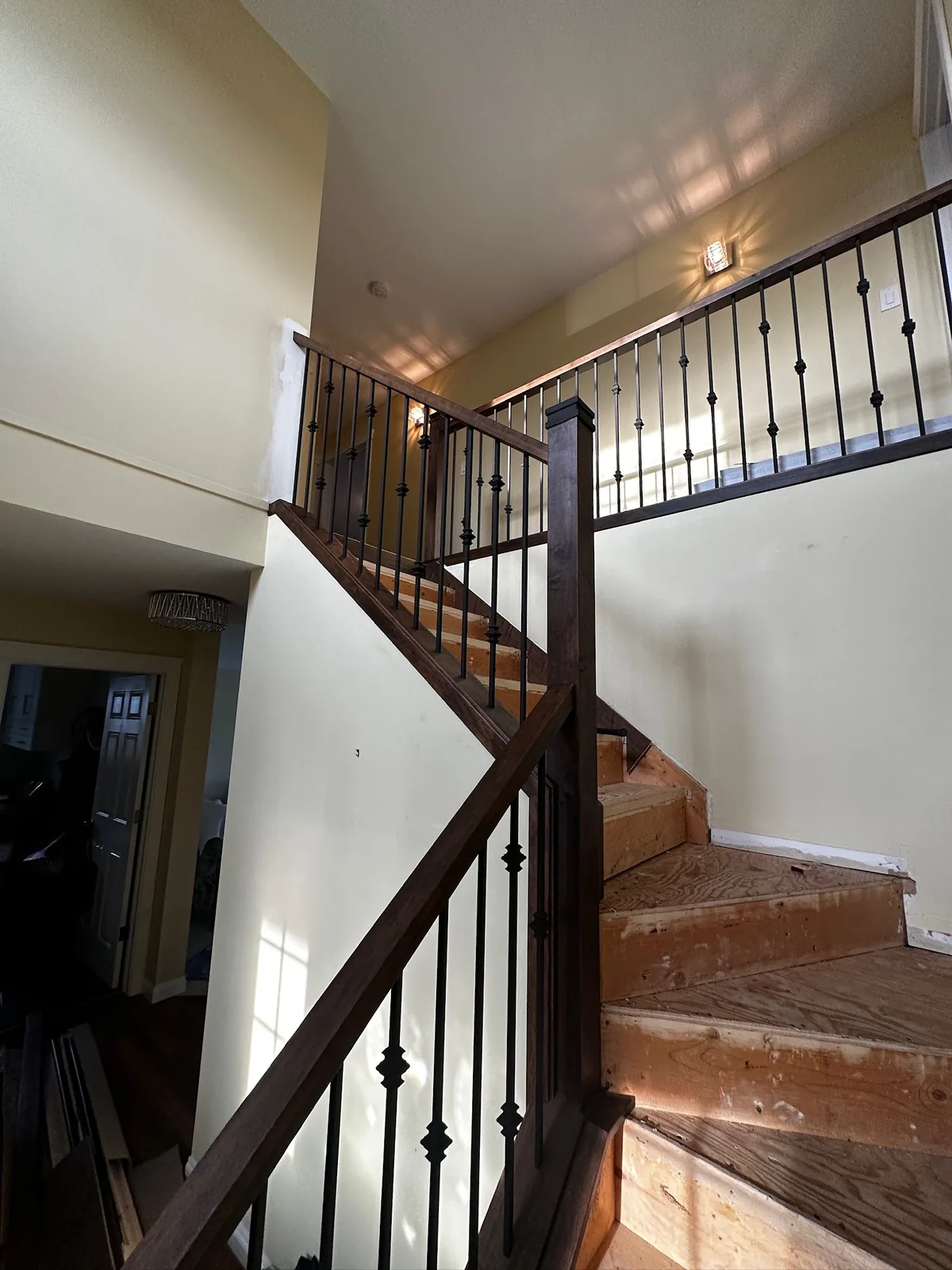 Custom staircase and railing built by Ben's Carpentry in the Edmonton area
