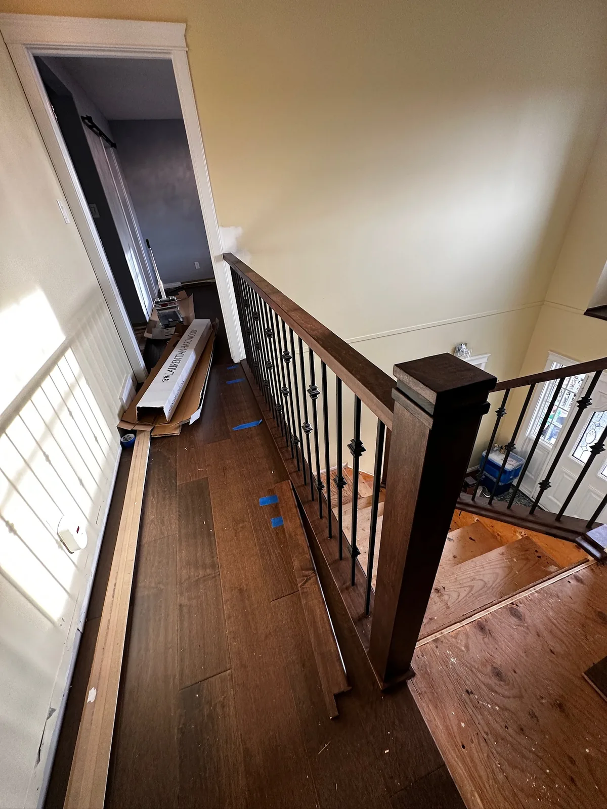 Custom staircase and railing built by Ben's Carpentry in the Edmonton area