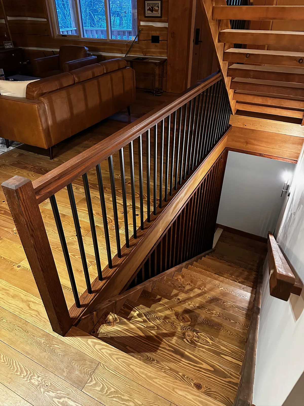 Custom staircase and railing built by Ben's Carpentry in the Edmonton area