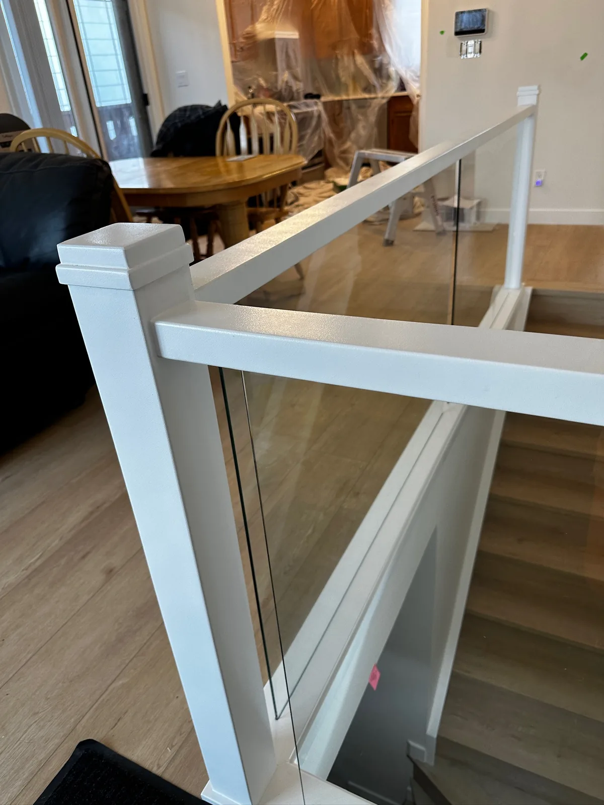 Custom staircase and railing built by Ben's Carpentry in the Edmonton area