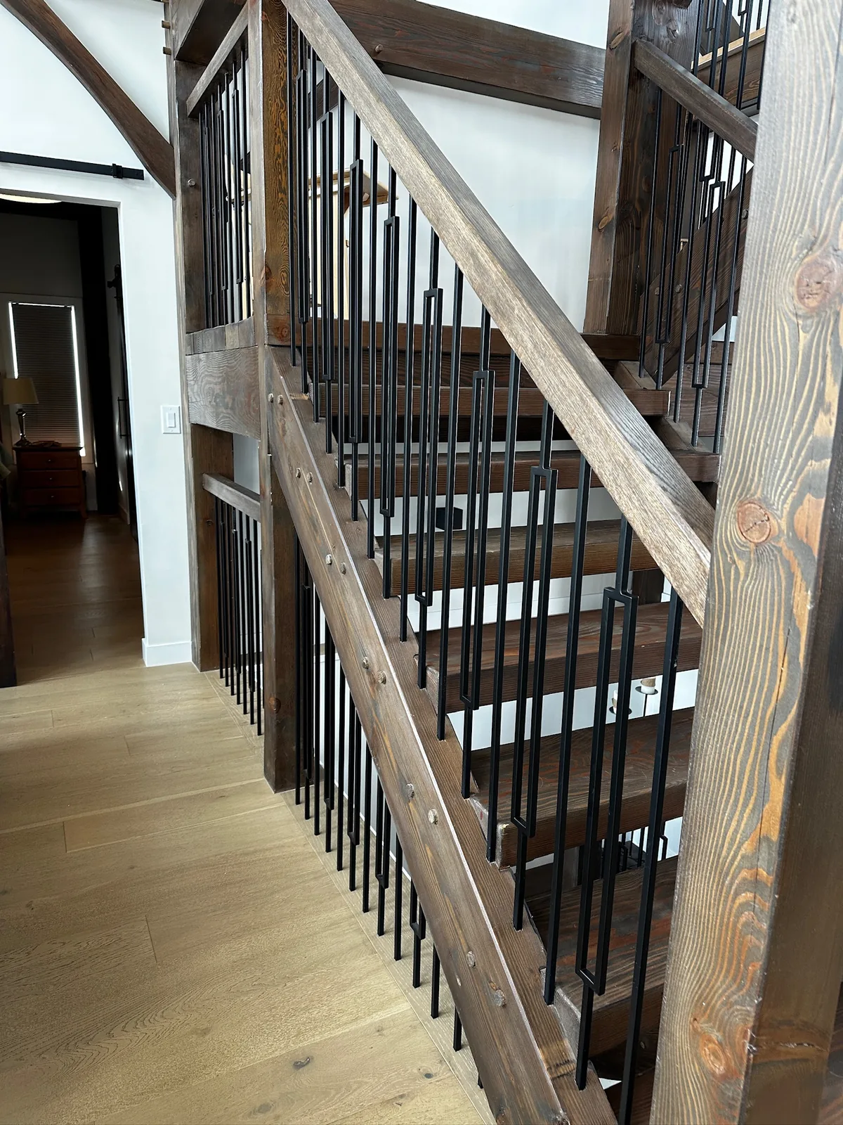 Custom staircase and railing built by Ben's Carpentry in the Edmonton area