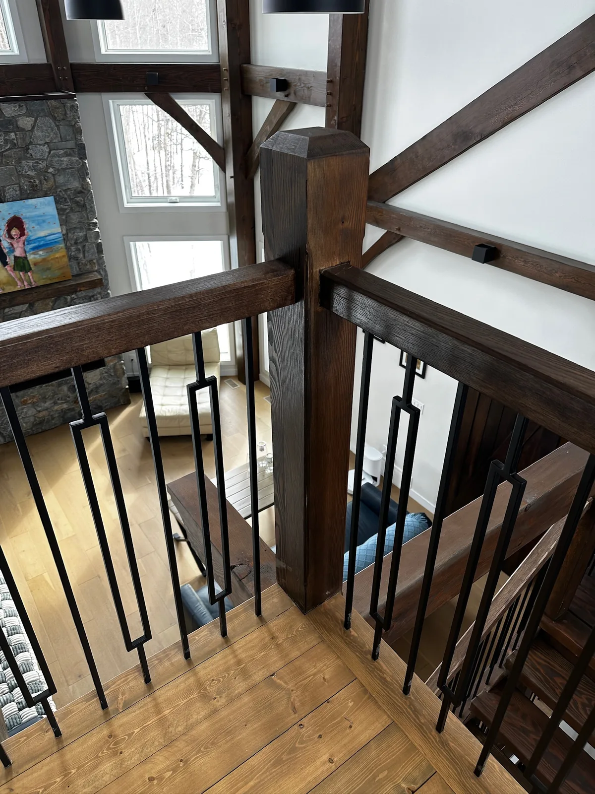Custom staircase and railing built by Ben's Carpentry in the Edmonton area