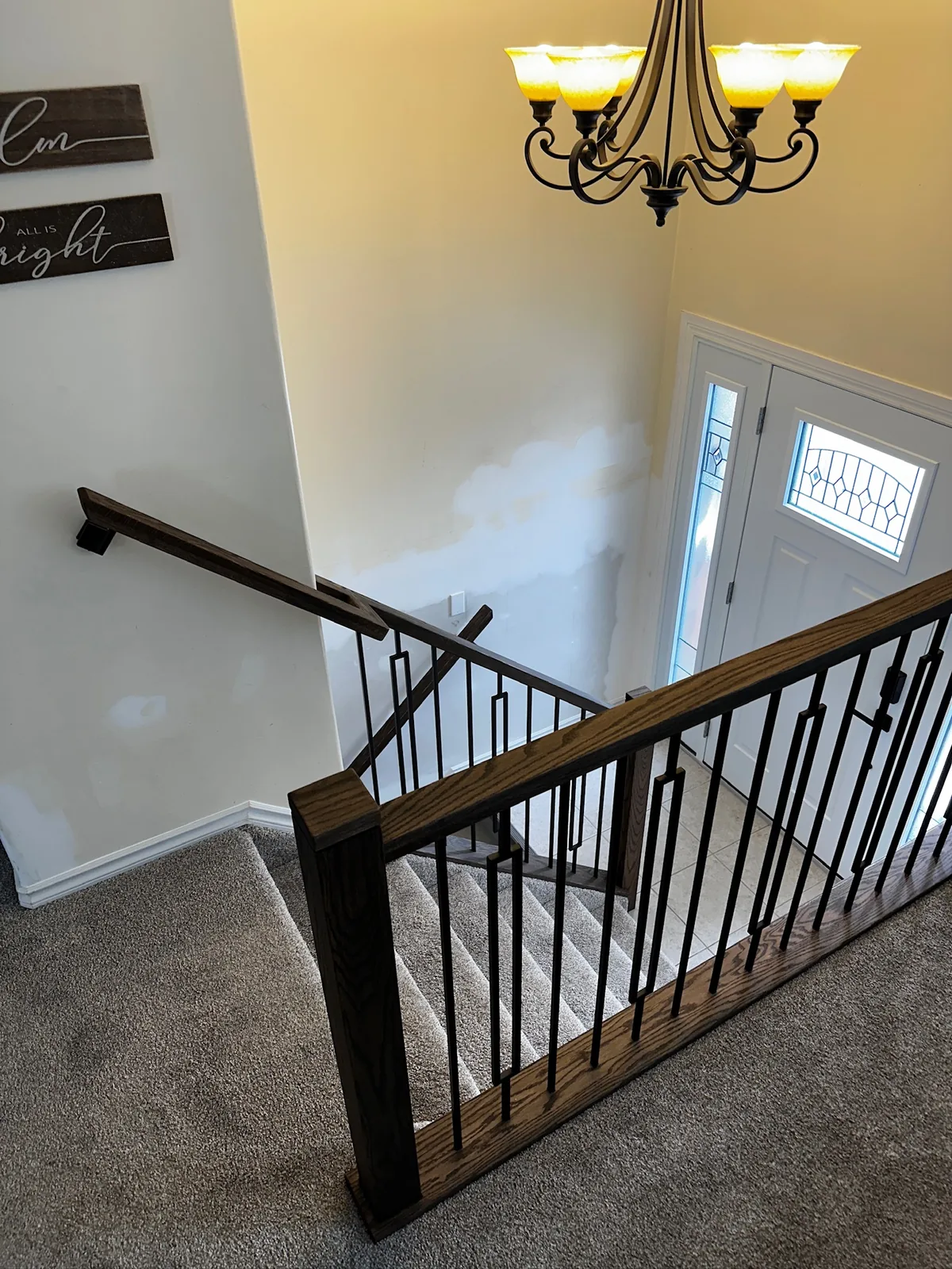 Custom staircase and railing built by Ben's Carpentry in the Edmonton area