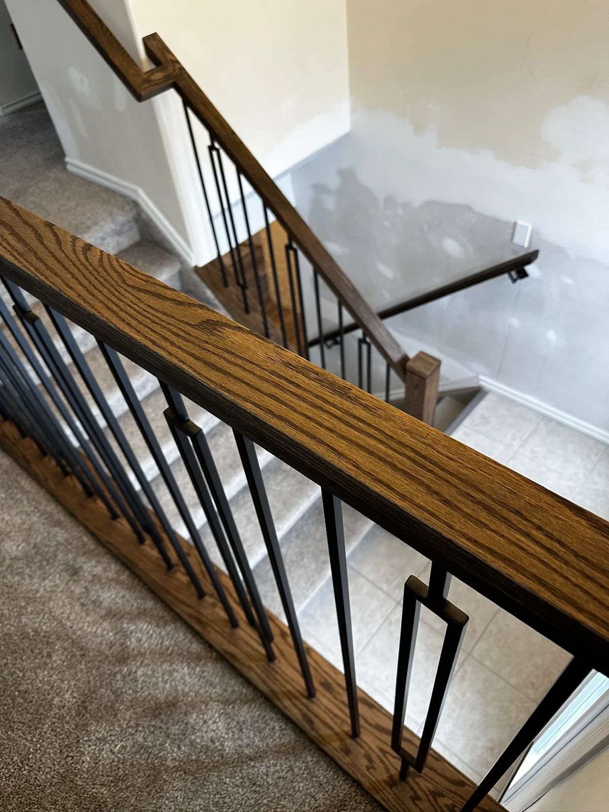 Custom staircase and railing built by Ben's Carpentry in the Edmonton area