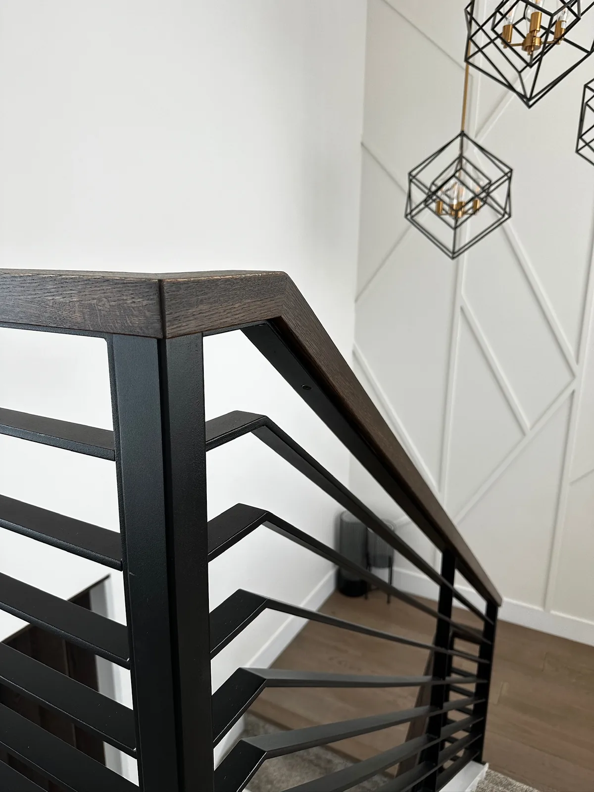 Custom staircase and railing built by Ben's Carpentry in the Edmonton area