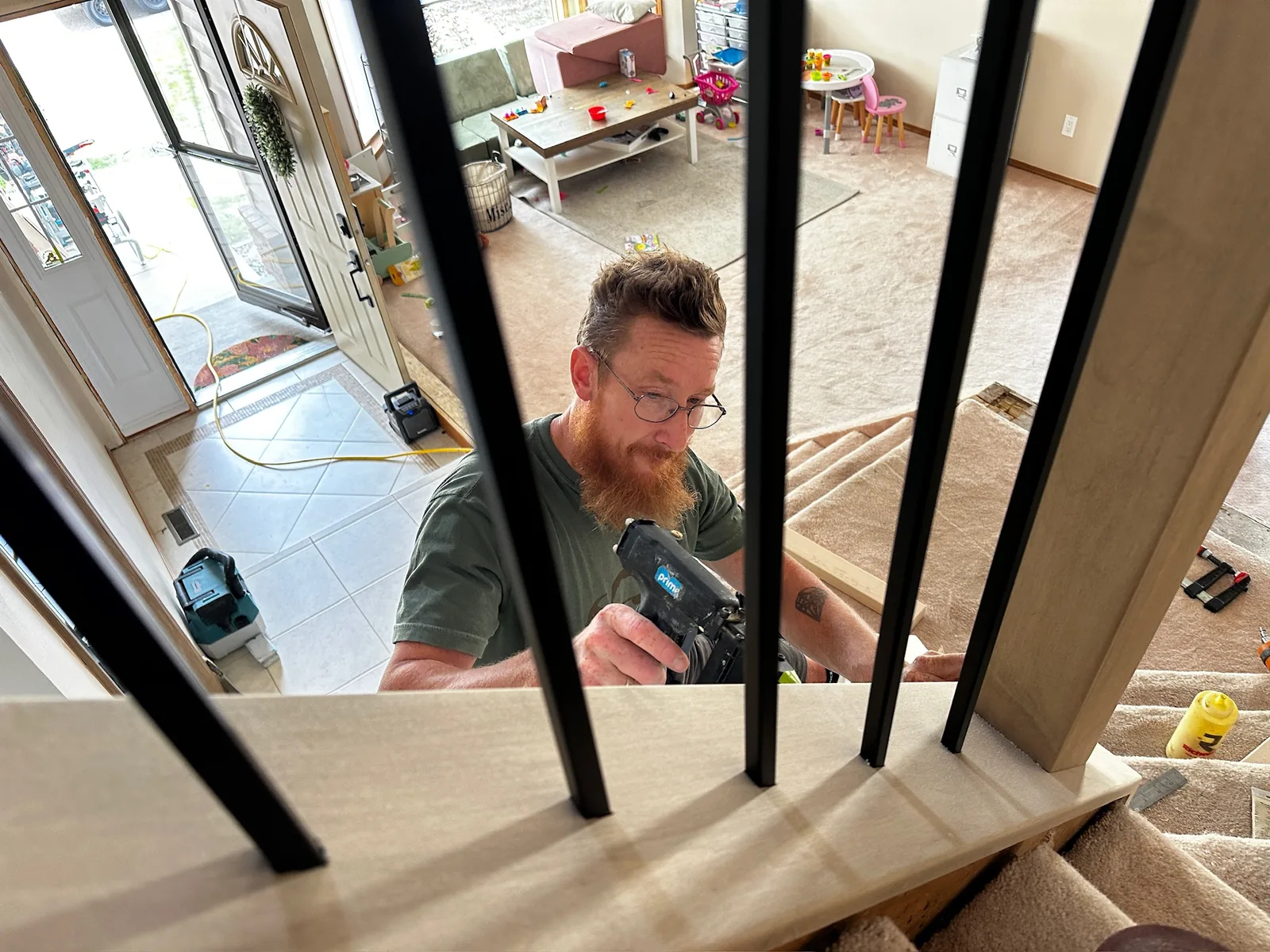 Ben Wheeler building and installing custom stairs and railings in the Edmonton area